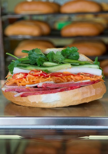 Banh Mi Thit - Vietnamese bread with coriander, cucumber, pickled carrot & white raddish and chillies.