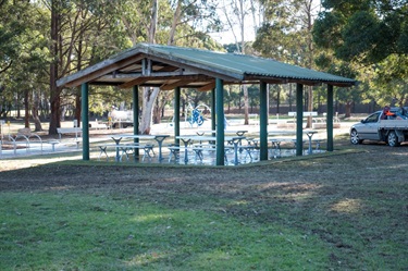 Shaded area with benches and tables