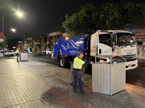 Street cleaning truck and bin with FCC staff