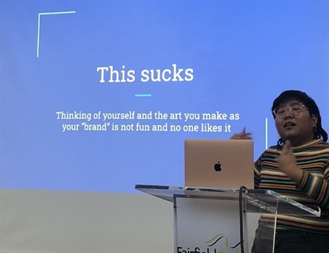 An artist presenting powerpoint.