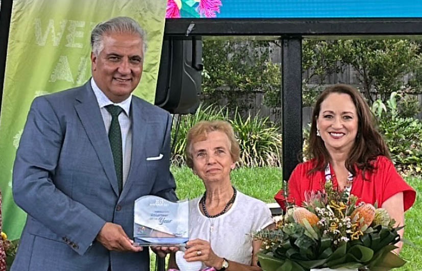 Portrait of Anna Froio holding Australia Day award with the Mayor