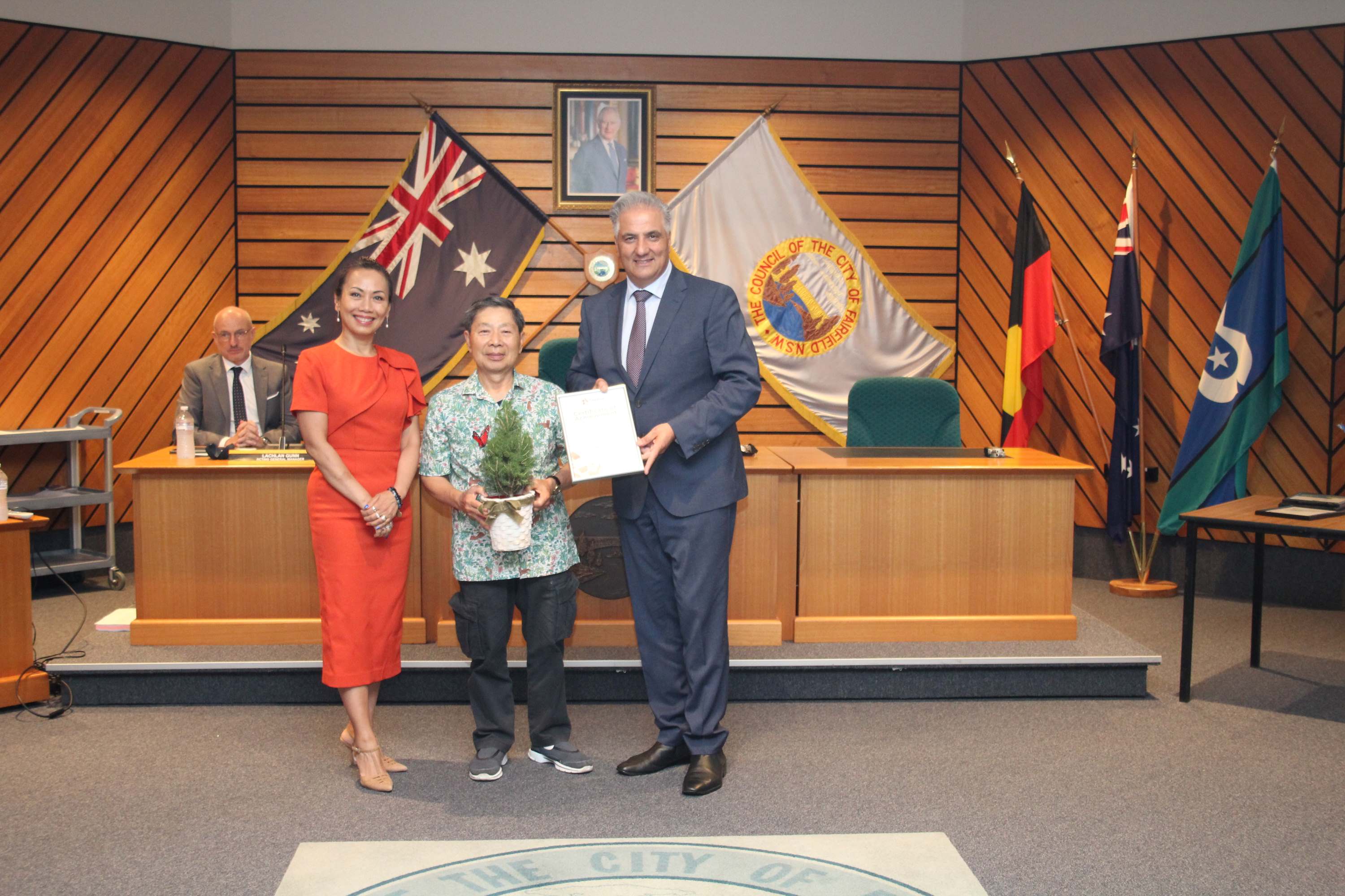 2024 Residential Garden of the Year Finalist, Quyen Truong with Mayor Frank Carbone and Deputy Mayor Dai Le