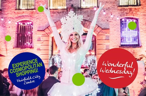 Performer for Wonderful Wednesday dressed in white with a snowflake crown