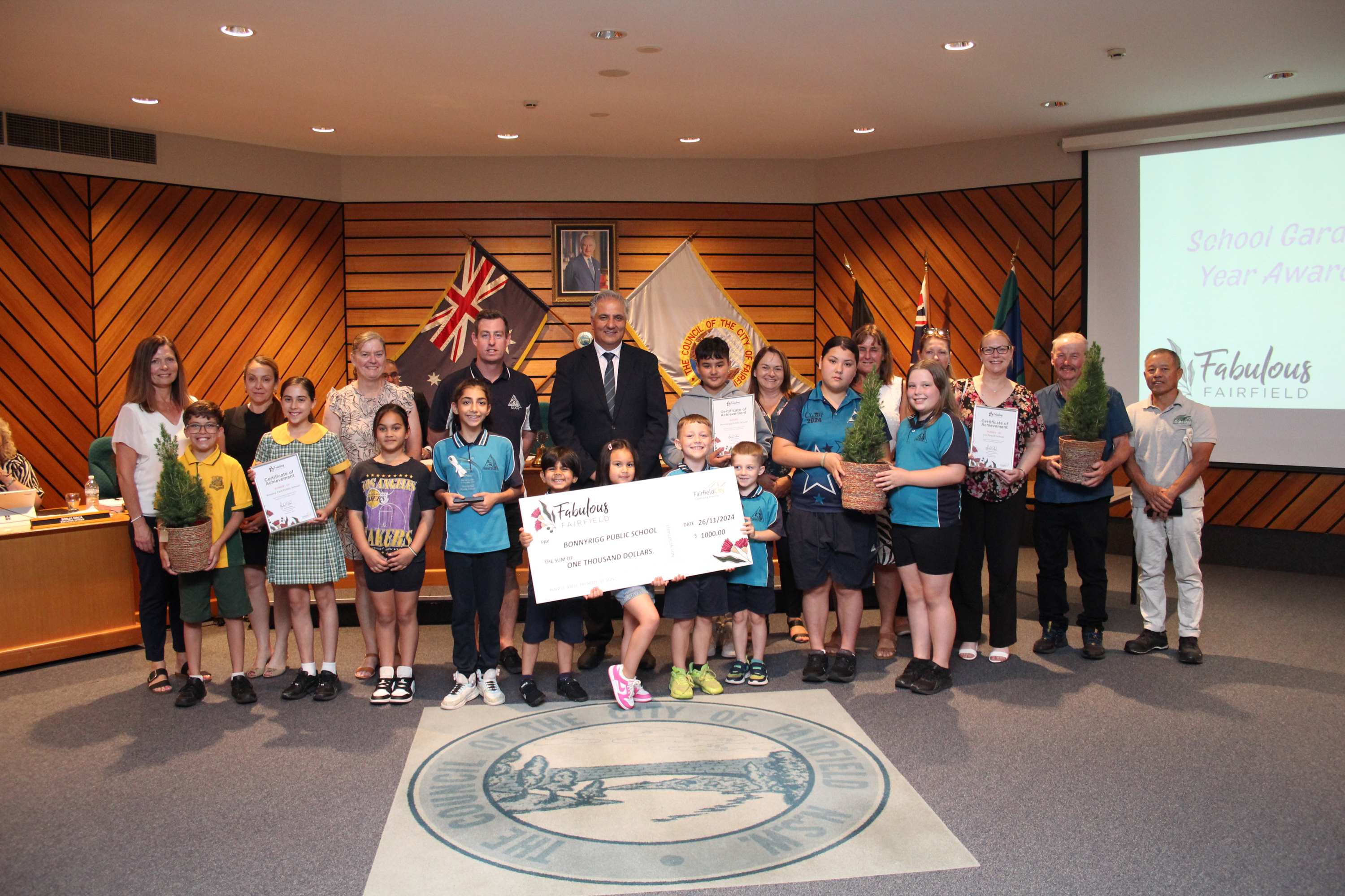 Group photo of the 2024 Annual School Garden Awards winner and runner ups with Mayor Frank Carbone