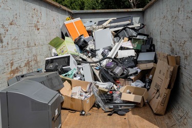 Container of E-Waste such as TVs, Microwaaves, etc.