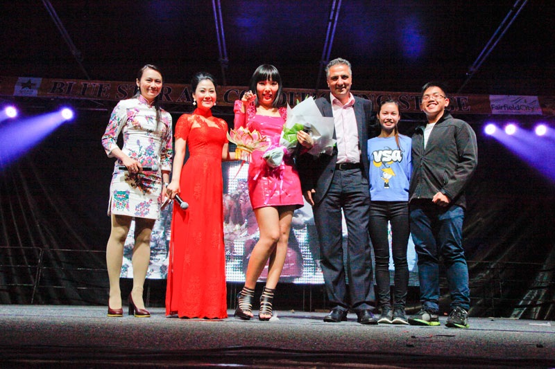 Mayor Frank Carbone on stage with Dami Im and others at the Cabramatta Moon Festival.