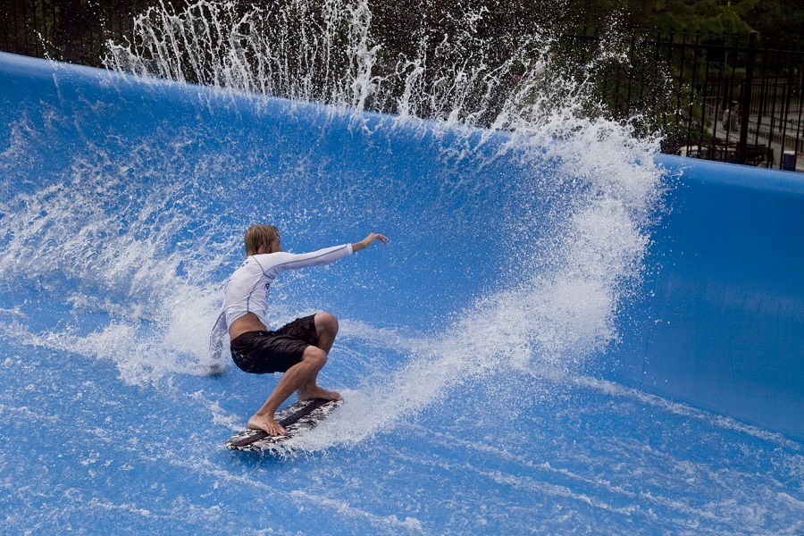 Man trying out the Wave Rider experience at Aquatopia