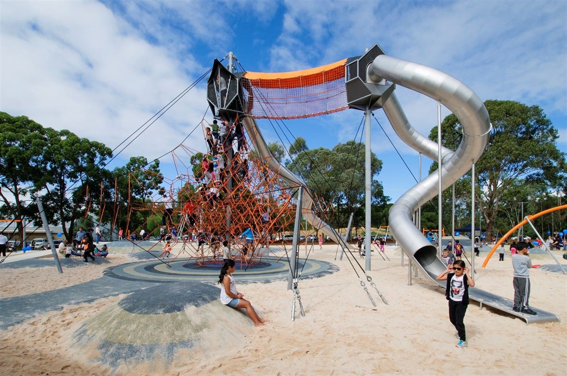 Climbing nets and slides over the sand pit at Fairfield Adventure Park.