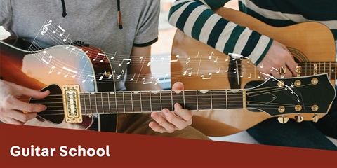 2 people playing guitars.